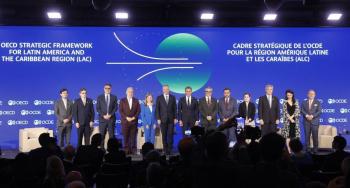 La guerra comercial reduce las perspectivas de crecimiento económico mundial, advierte la OCDE